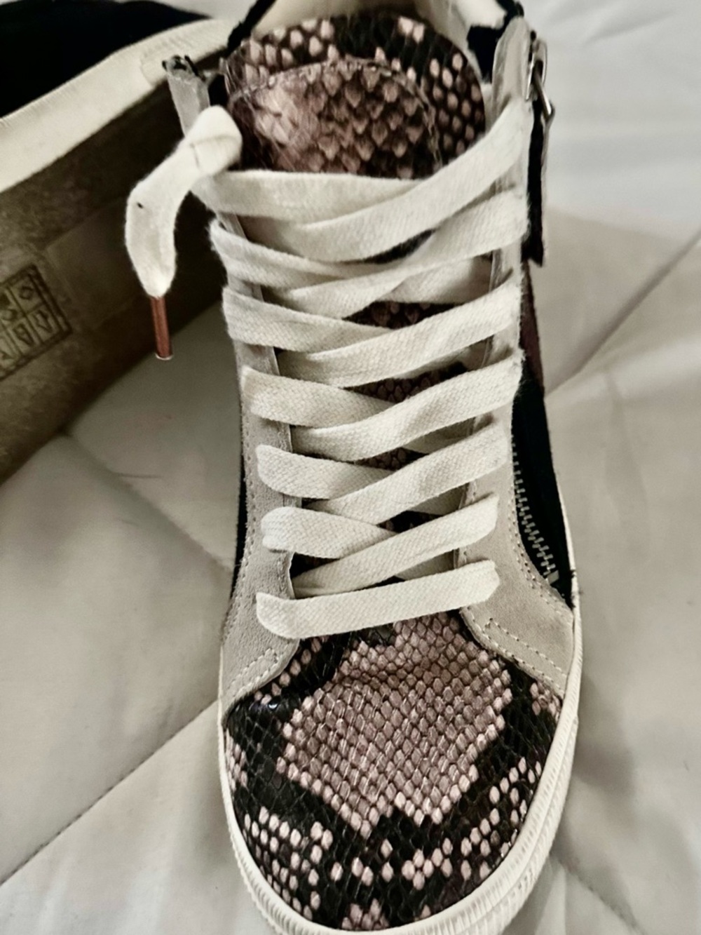 Dolce Vita Black and White High-Top Sneaker with Side Zipper
